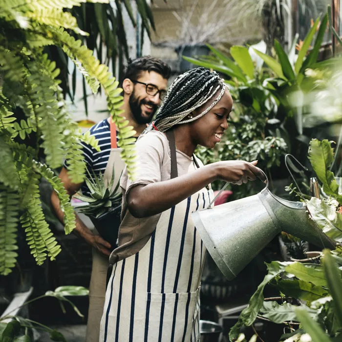 Woman watering plants
